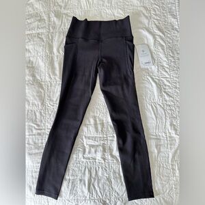 NWT Athleta SALUTATION STASH POCKET II
RIB 7/8 TIGHT Black Small